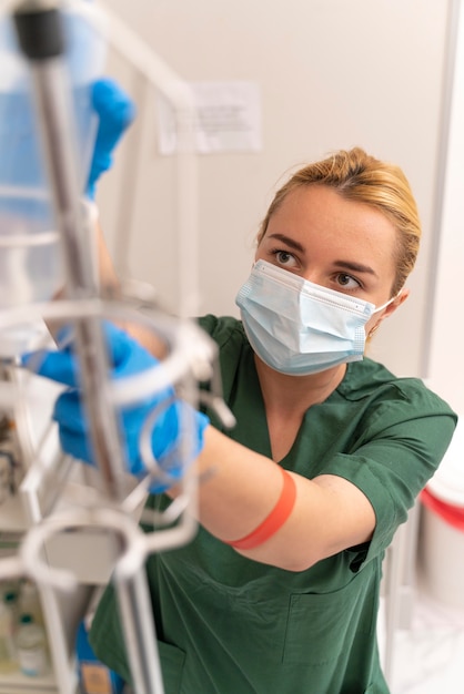 Female student at medicine wearing medical mask