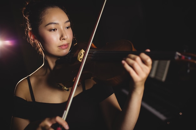 Female student playing violin