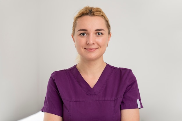 Female student practicing medicine