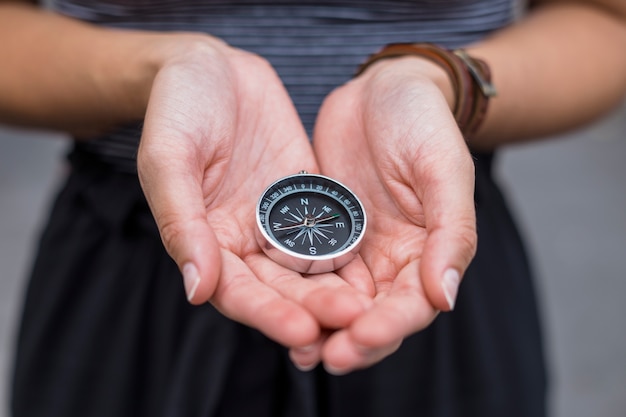 Female tourist with compass