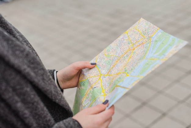 Free photo female tourist with map