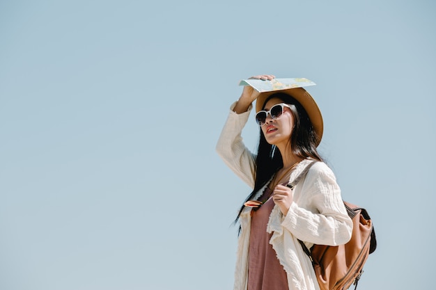 Female tourists spread their arms and held their wings