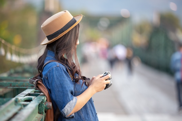 Female tourists who are taking photos of the atmosphere