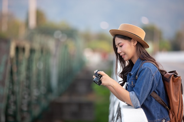 Female tourists who are taking photos of the atmosphere