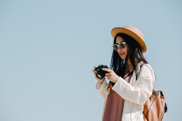 Female tourists who are taking photos of the atmosphere 