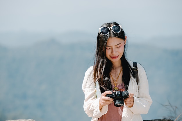 Female tourists who are taking photos of the atmosphere 