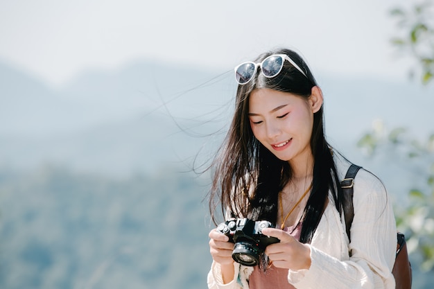 Female tourists who are taking photos of the atmosphere 