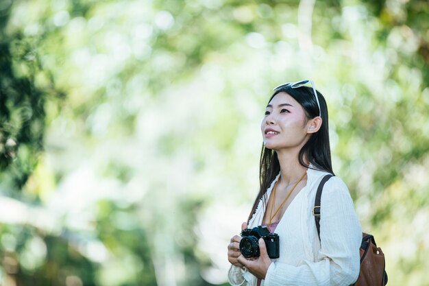 Female tourists who are taking photos of the atmosphere