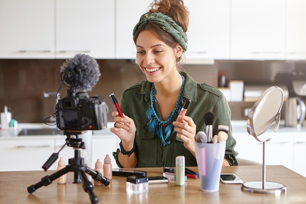 Free Photo female vlogger filming makeup video