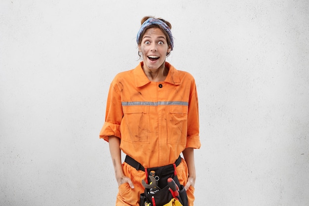 Free photo female worker wearing work clothes