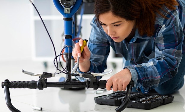 Female working at bike