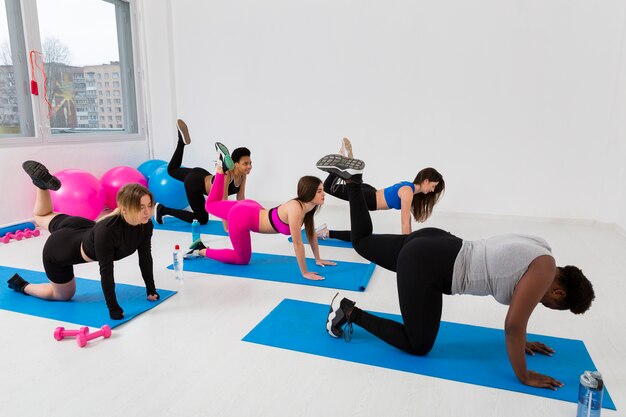 Females working hard at fitness class