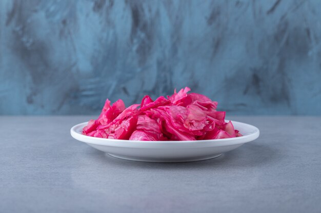 Fermented red cabbage lies in bowl