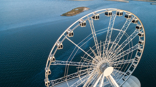 Free Photo ferris wheel view to the sea 3