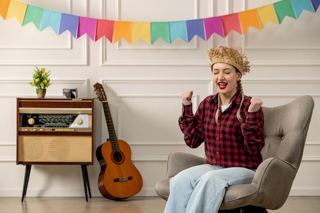 Free Photo festa junina cute girl in straw hat brazilian midsummer with retro radio guitar excited