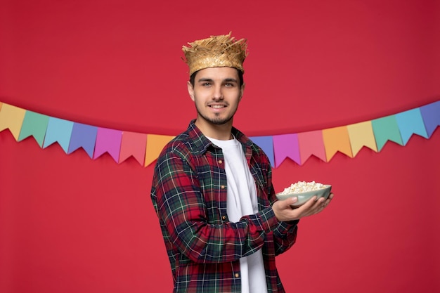 Festa junina happy cute guy wearing straw hat celebrating brazilian festival excited for party