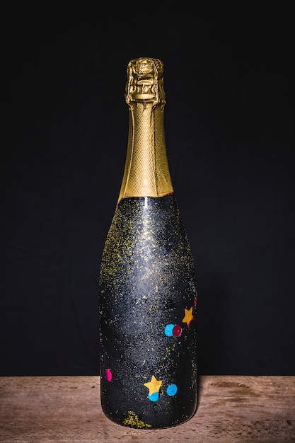 Free photo festive bottle of champagne