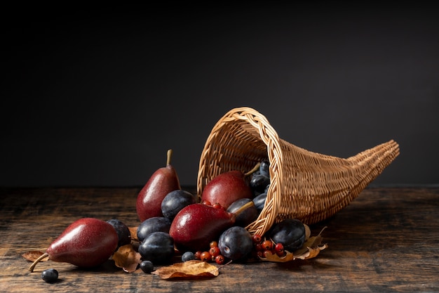 Festive cornucopia arrangement with delicious fruits