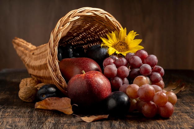 Festive cornucopia arrangement with delicious fruits