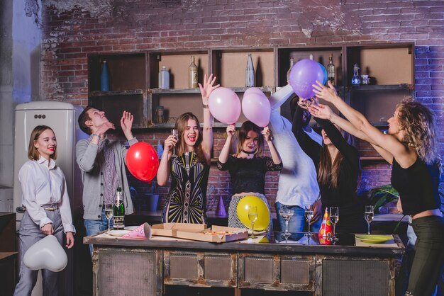 Festive friends with balloons