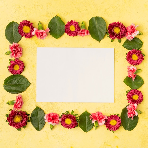 Free Photo festive natural flower frame composition and copy space white card