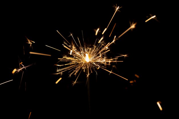 Festive shiny sparkler in the dark