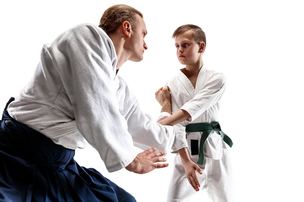 Free photo fighters in white kimono on white room