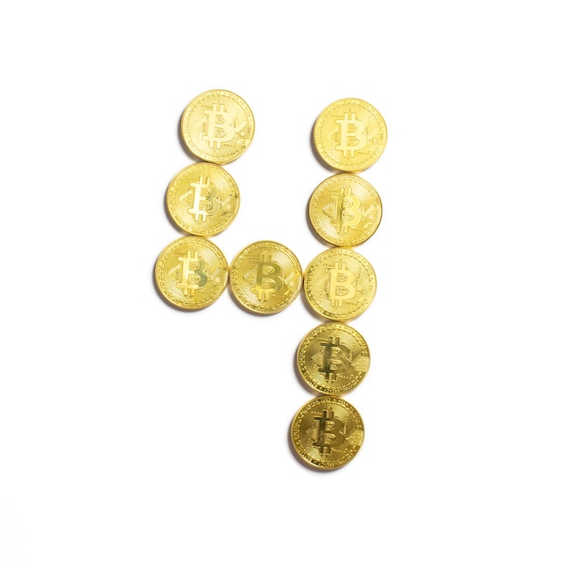 Free photo the figure of 4 laid out of bitcoin coins and isolated on white background