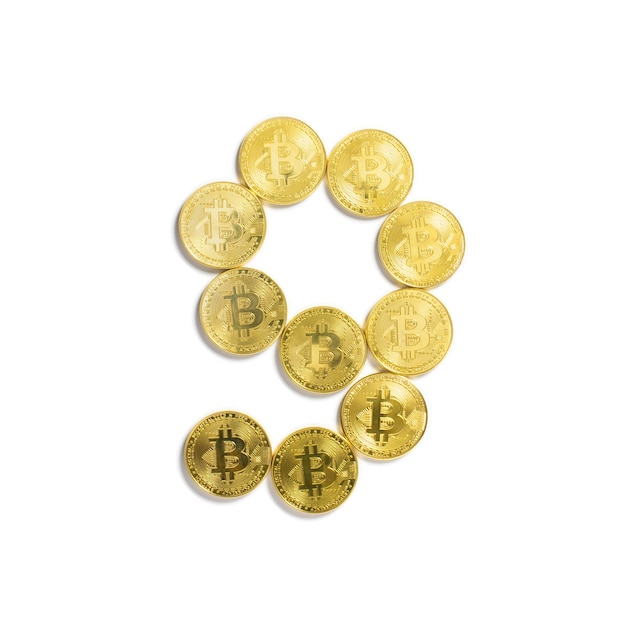 Free Photo the figure of 9 laid out of bitcoin coins and isolated on white background