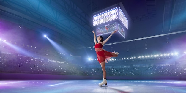 Figure skating girl in ice arena