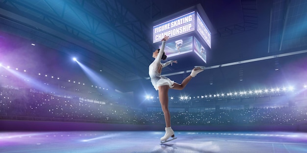 Figure skating girl in ice arena