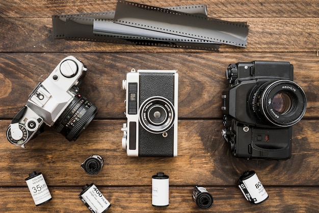 Free photo film and cameras on lumber tabletop