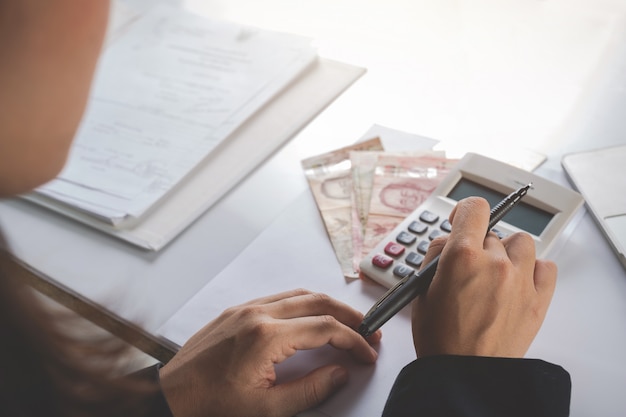 finance and accounting concept. business woman working on desk