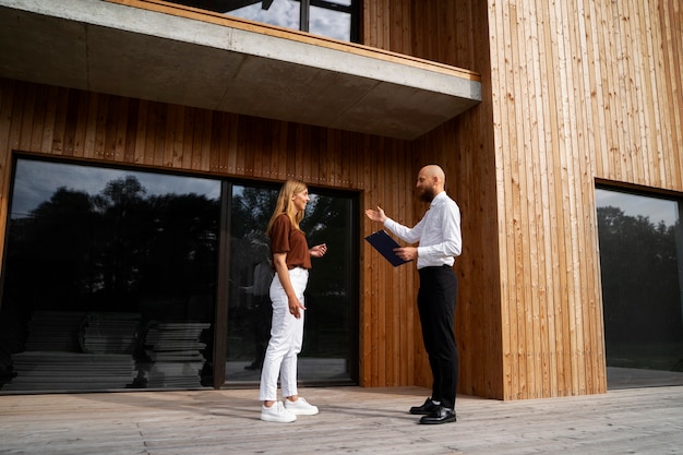 Free photo financial independent woman buying new house