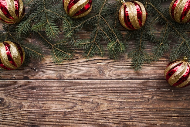 Fir tree branches with shiny baubles