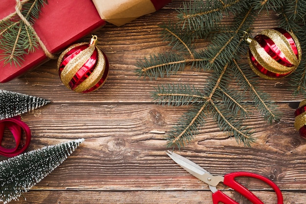 Fir tree branches with small scissors 