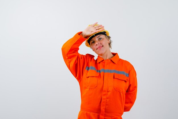 Firewoman in her uniform with a safety helmet