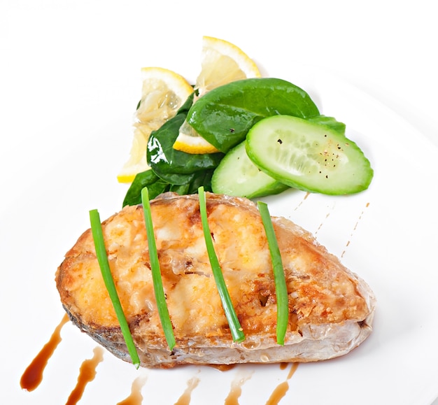 Free Photo fish dish - fried fish fillet with vegetables 