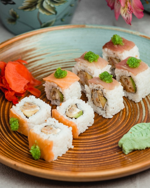 fish sushi with rice and wasabi