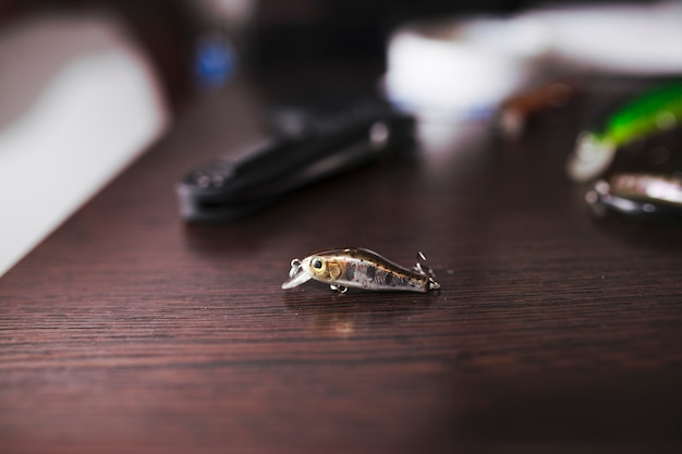 Fishing lure on wooden background