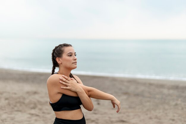 Fit young woman in sportswear outdoor