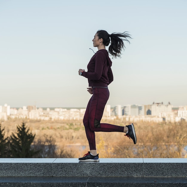 Fit young woman training outdoor