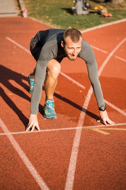 Fitness boy prepared to run