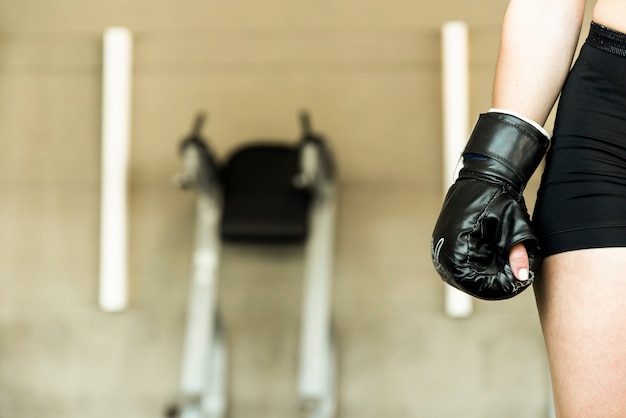 Free Photo fitness girl wearing boxing glove