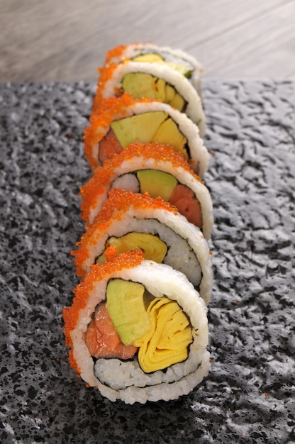 Free Photo five delicious sushi rolls