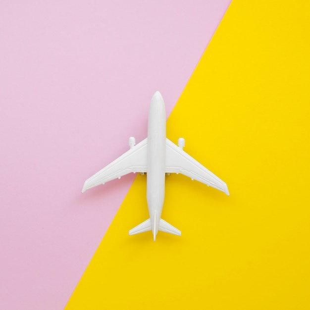 Flat lay airplane toy on table