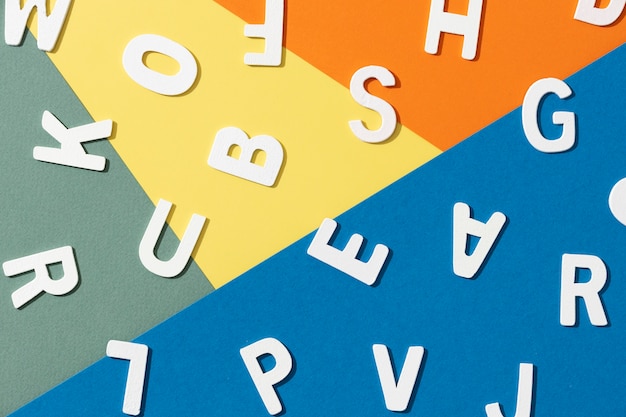 Free photo flat lay of alphabet letters for education day