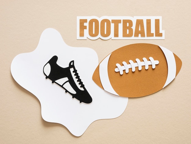 Free photo flat lay of american football and sneaker