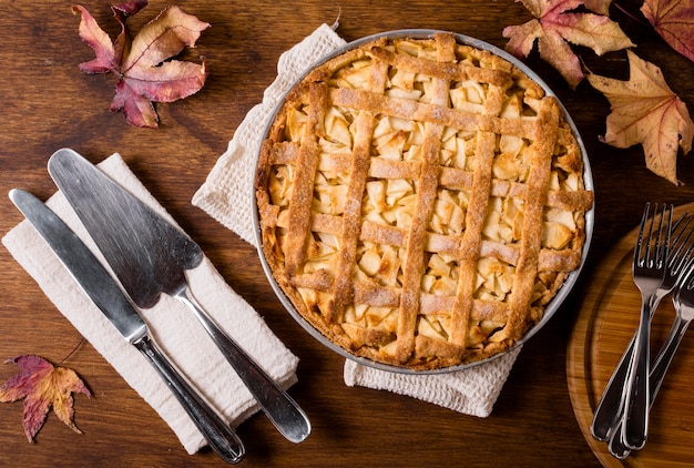 Flat lay of apple pie for thanksgiving with cutlery