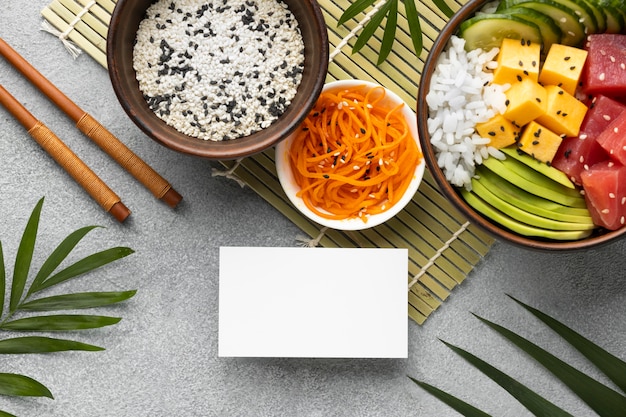 Flat lay arrangement of delicious poke bowl